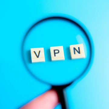 vpn services best 2020 magnifying glass over vpn written from cubes blue background